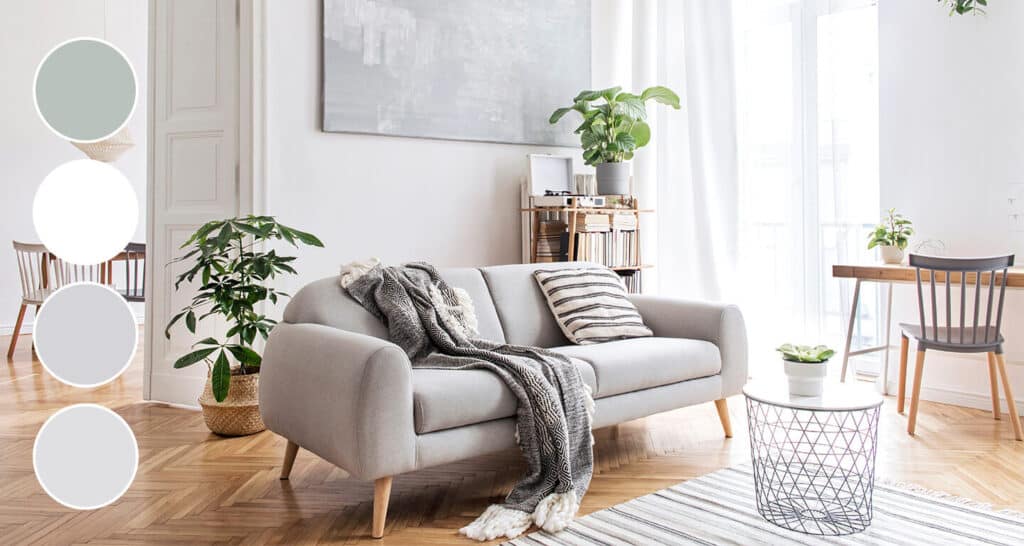 Gray couch in bright living room done in cool neutrals